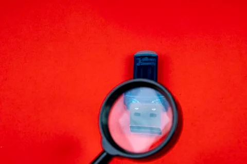 Magnifying glass data stick - data security and verification Stock Photos