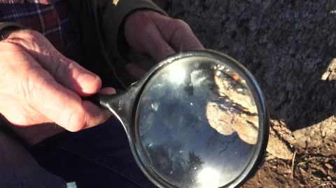 Magnifying glass, demonstration Stock Footage 45428476