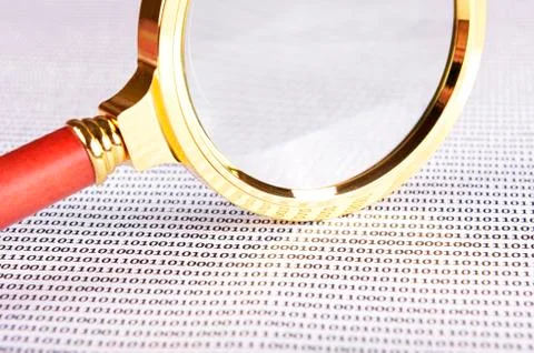 Magnifying glass on the digital code Foto stock