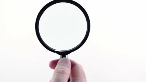 Magnifying glass in the hand, easy to mask template for universal concept. Sc Stock Footage 139765853