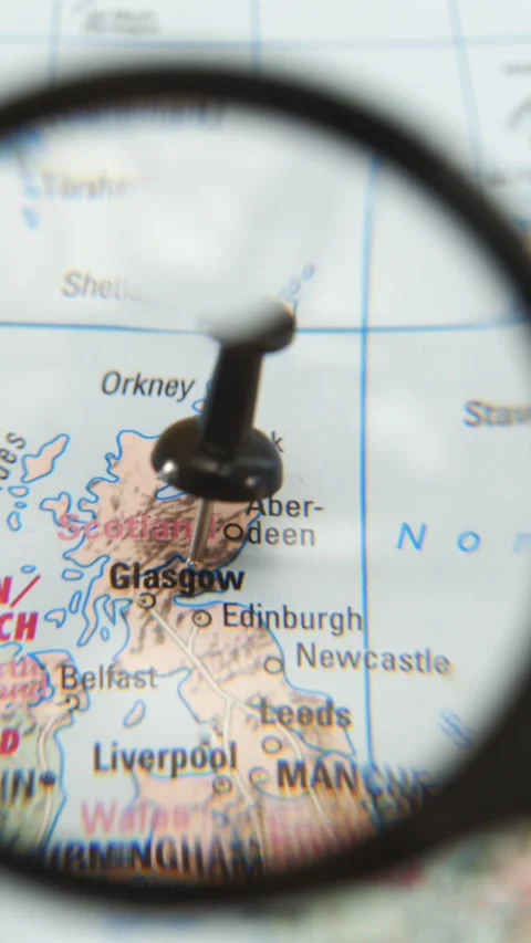Magnifying glass highlights location on map of Glasgow Stock Footage 340482682