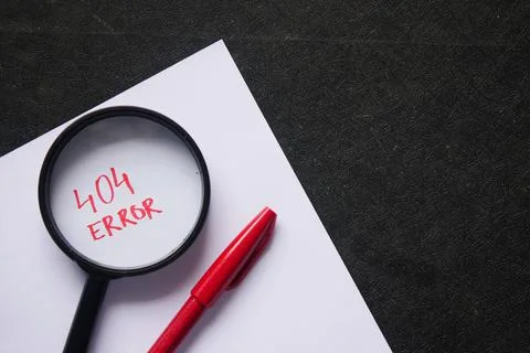 Magnifying glass inspecting 404 error close up Stock Photos