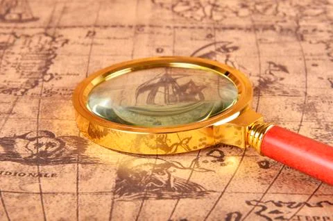Magnifying glass on the map Stock Photos