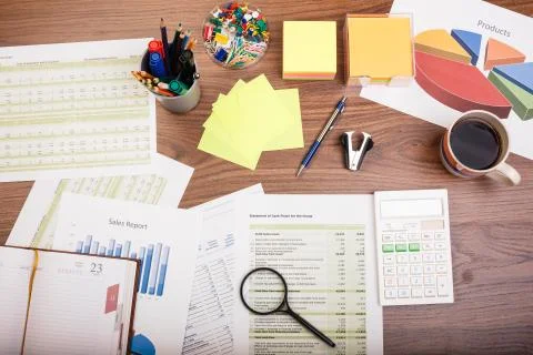 Magnifying glass on the table Stock Photos