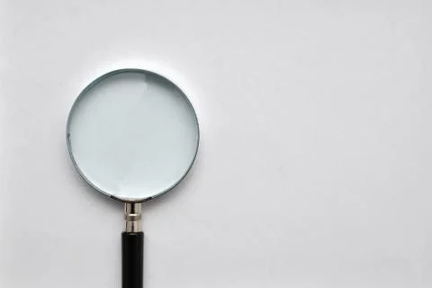 Magnifying glass on white background Stock Photos