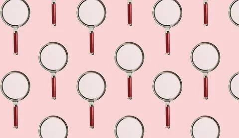 Magnifying glasses arranged in a repeating pattern, symbolizing exploration, Stock Photos