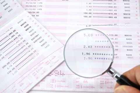 Magnifying interest Stock Photos