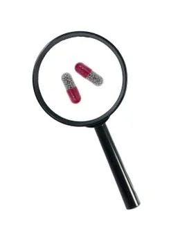 Magnifying medication Stock Photos