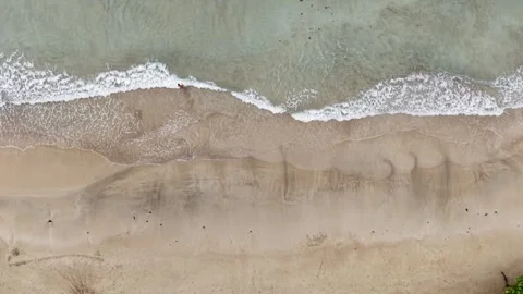 Magura Beach Shoreline Waves Sand Lone Person Lateral Drift Overcast Vídeo Stock 332276053