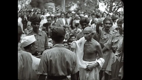 Mahatma Gandhi Walking Through Cheering Crowds Stock Footage