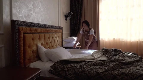 The maid cleans the hotel rooms | Stock Video | Pond5