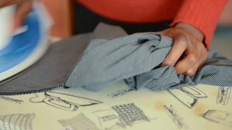 Maid ironing Stock Footage 23100220
