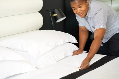 Maid Making Bed Stock Photos