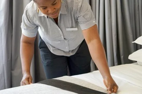 Maid Making Bed Stock Photos