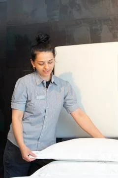 Maid Making Bed Stock Photos