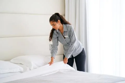 Maid Making Bed Stock Photos