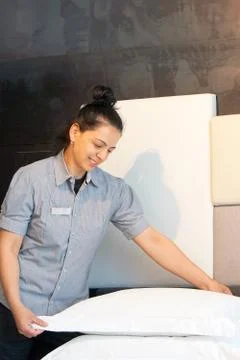 Maid Making Bed Stock Photos