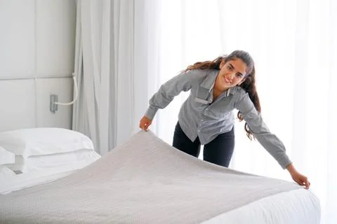 Maid Making Bed Stock Photos