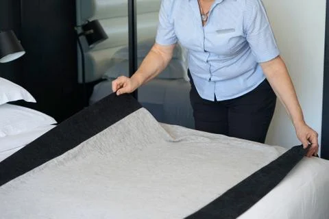 Maid Making Bed Stock Photos