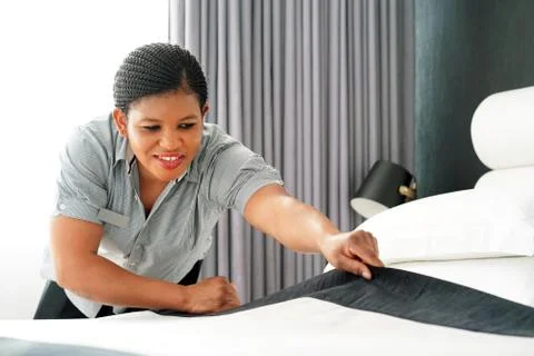 Maid Making Bed Stock Photos
