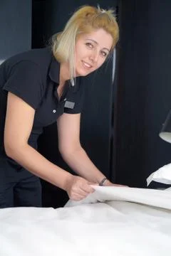 Maid Making Bed Stock Photos
