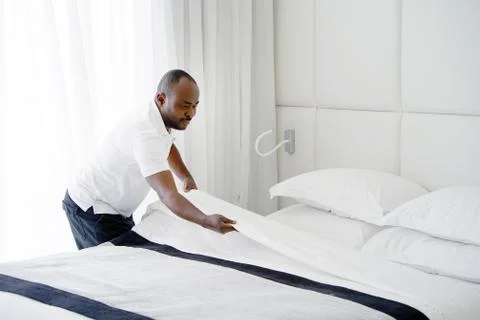 Maid Making Bed Stock Photos