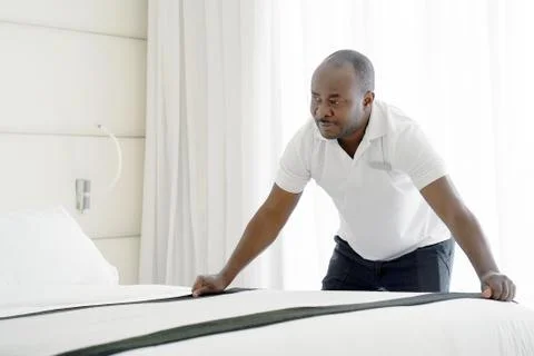 Maid Making Bed Stock Photos