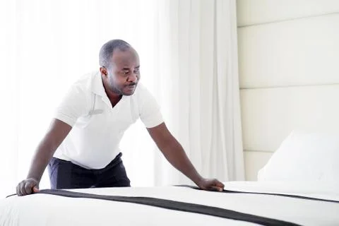 Maid Making Bed Stock Photos