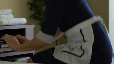 Maid stealing euros from wallet of client in hotel room, dishonest employee Video stock 96324312