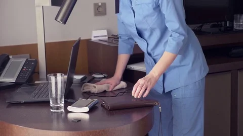 The maid steals money while cleaning the room in a five-star hotel. 4k. Stock Footage 83164278