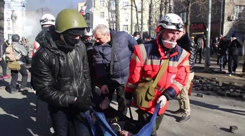 Maidan. Protesters and doctors take the wounded.  Kiev. 16.03.2014 Stock Footage 48068673