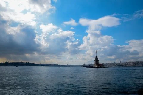Maiden Tower or Kiz Kulesi with floating tourist boats Stock Photos