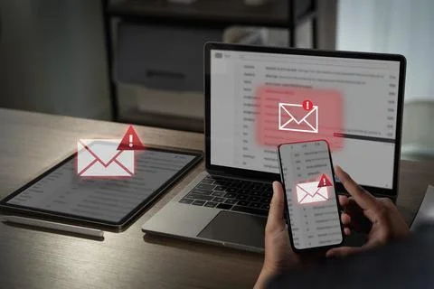 A mail alert, email hack sms spam image shows person checking email alerts mu Stock Photos