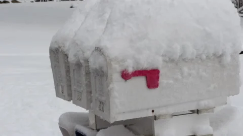 Mail Box Buried in Snow with Red Flag Stock Footage 44400298