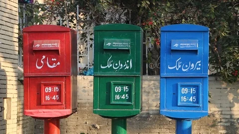 Mail boxes of Pakistan State Post erected outside a local post office. Stock Footage 86660198