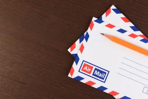 Mail concept with many envelopes on the table. Stock Photos