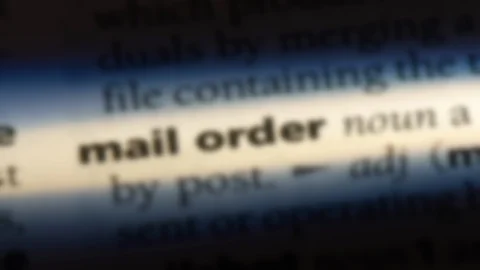 Mail order word in a dictionary. Stock Footage 99563225