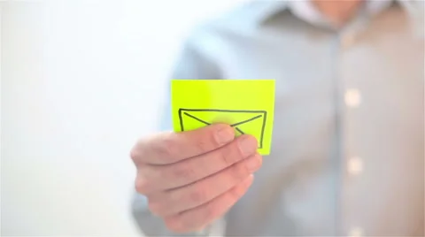 Mail, sms. A man sticks a note on transparent screen Stock Footage 68088615