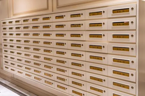 Mailbox array in postal room of a luxury apartment building Foto stock