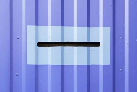 Mailbox on a blue door Stock Photos