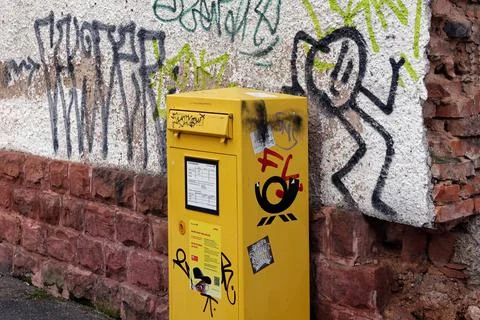 Mailbox in front of graffiti wall Stock Photos