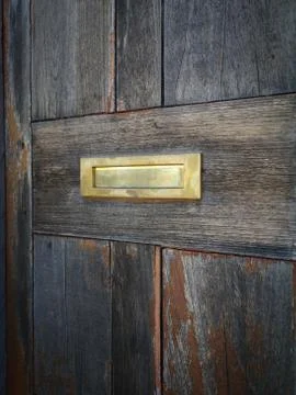 Mailbox in an old door Stock Photos