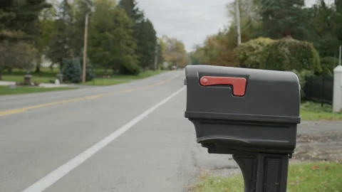 A mailbox by the road. Typical for the suburbs of the UNITED STATES Stock Footage 165974126