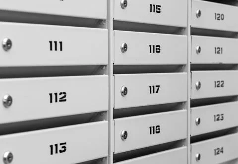 Mailboxes in the condominium. Mailboxes filled. Mail boxes filled of leaflets Stock Photos