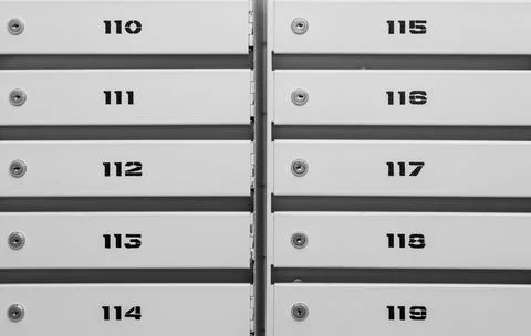 Mailboxes in the condominium. Mailboxes filled. Mail boxes filled of leaflets Stock Photos