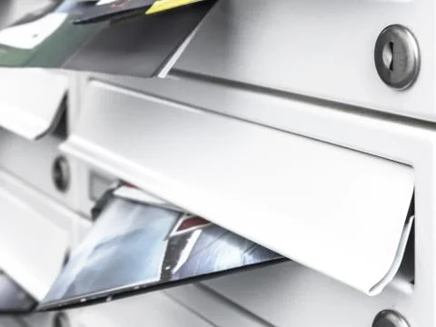 Mailboxes filled of flyers Stock Photos