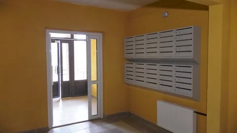 Mailboxes in the hall of the multi-storey building. Stock Footage 117568339