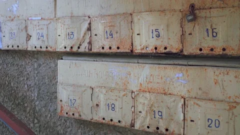 Mailboxes hanging on the wall of an old house Stock Footage 143918642