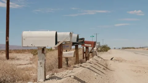 Mailboxes at a highway in desert Vidéo 247472657