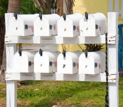 Mailboxes lined up in a small town. Stock Photos